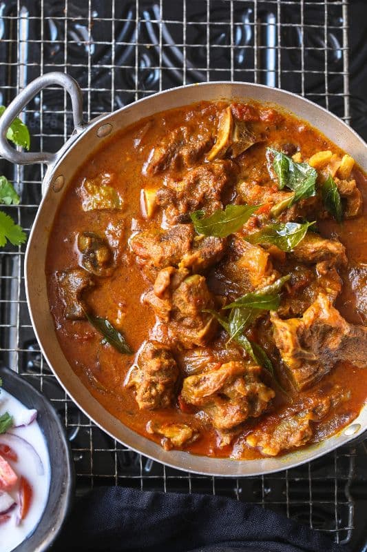30. Saag Goat (Bone-In)